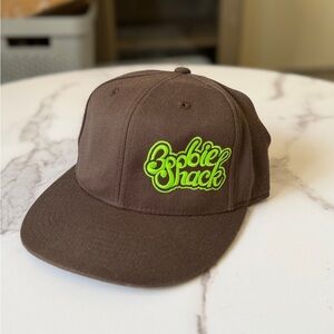 Brown Snapback Hat with Neon Green 'Bobbie Shack' logo